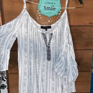 Off the shoulder blouse/shirt. Loose fit